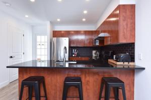 Kuchyň nebo kuchyňský kout v ubytování 2-Level Home - Tremblant Mountain View - Fireplace