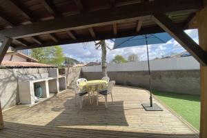 En terrasse eller udendørsområde på maison Isabel à Arès