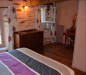 Ένα ή περισσότερα κρεβάτια σε δωμάτιο στο Ker Cado - Chambre d'hôtes