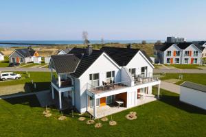 an aerial view of a house with a roof at Räuberhöhle by Seeblick ferien oro in Kappeln +14 photos