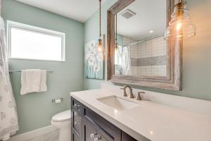a bathroom with a sink and a mirror at Spacious Yard, Near Golf Modern Home in Hollywood in Hollywood Beach +16 photos