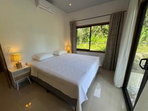 Postel nebo postele na pokoji v ubytování Casa Andersson - Your Caribbean House with Pool + 25 fotografií