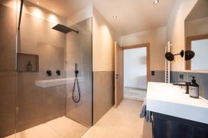 Koupelna v ubytování Apartment Oberhaslerhof + 26 fotografií