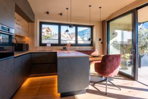 Η κουζίνα ή μικρή κουζίνα στο Levita Living Freiheit +35 φωτογραφίες