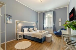 Ένα ή περισσότερα κρεβάτια σε δωμάτιο στο NEW! Da Tiffany - 115mq apartment with Wi-Fi, Disney, Netflix - 8 people