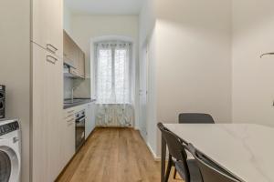 Η κουζίνα ή μικρή κουζίνα στο NEW! Da Tiffany - 115mq apartment with Wi-Fi, Disney, Netflix - 8 people +28 φωτογραφίες