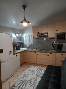 Køkken eller tekøkken på Studio et Mobil-home climatisé