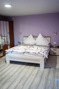 Ένα ή περισσότερα κρεβάτια σε δωμάτιο στο OPG Lukaček