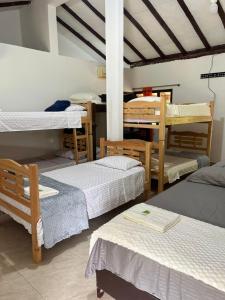 Ένα ή περισσότερα κρεβάτια σε δωμάτιο στο Lagos de Mararay