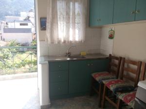 Kuchyň nebo kuchyňský kout v ubytování Anastasia - Efthimios Apartments