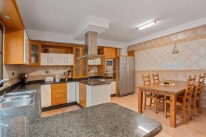 Kuchyň nebo kuchyňský kout v ubytování Corralejo Ian’s Dreams