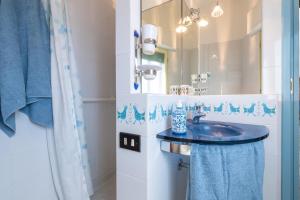 Koupelna v ubytování Cà du Savio + 12 fotografií