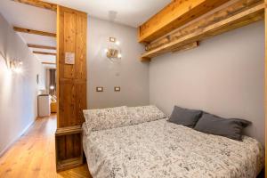 Voodi või voodid majutusasutuse Casa Andrea vista Monte Bianco toas