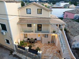 an aerial view of a house with a patio at Seawind Gouvia in Gouvia