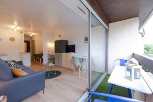 TV a/nebo společenská místnost v ubytování Studio Du Port 17 - à 100m du port ostréicole