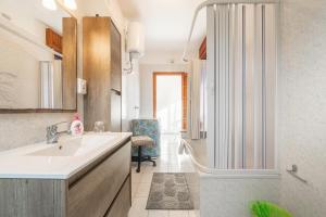 Koupelna v ubytování Casa Vacanze San Giovanni + 18 fotografií