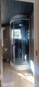 an empty room with a glass wall in a house at Cozy cabin in the Gilja paradise in Frafjord