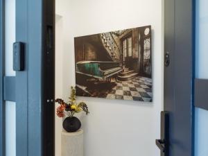 Et tv og/eller underholdning på L'Heritage Collection Romana Apartments