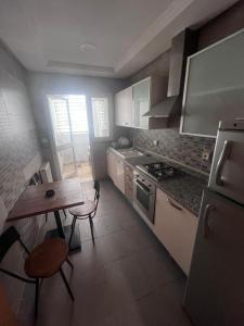 Kuchyň nebo kuchyňský kout v ubytování Luxury lac 2 mall