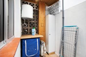 a small room with a blue trash can in a house at Mypris Home 2 in Tacoronte +20 photos