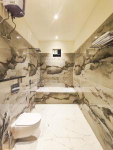 Koupelna v ubytování Resort K Sea View Mandarmoni