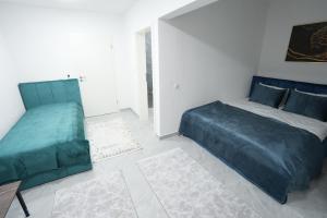 Ένα ή περισσότερα κρεβάτια σε δωμάτιο στο Wohnung IB - Business & Komfort