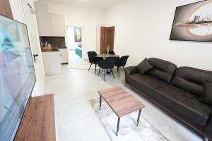 Χώρος καθιστικού στο Wohnung IB - Business & Komfort