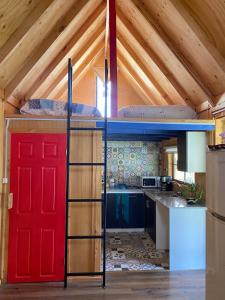 Kuchyň nebo kuchyňský kout v ubytování Cabaña rústica y confortable en Colchagua + 14 fotografií