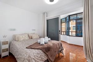 Ένα ή περισσότερα κρεβάτια σε δωμάτιο στο Tamaragua