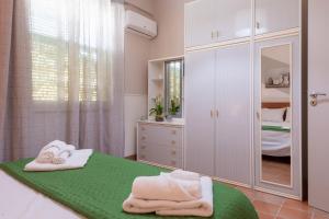 Postel nebo postele na pokoji v ubytování Appartamento in Villa Tulipano