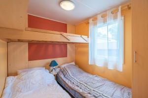 Postel nebo postele na pokoji v ubytování Mh 61 La Tremblade