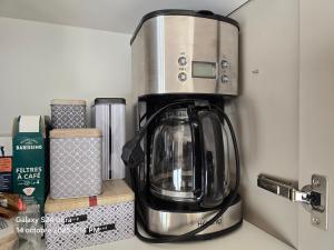 a coffee maker sitting on top of a counter at Sombrero - SILS in Caen