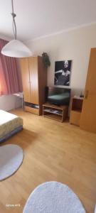 Una televisión o centro de entretenimiento en Favorite apartment