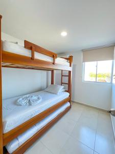 Postel nebo postele na pokoji v ubytování Olas Caribe 401 + 63 fotografií