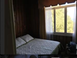 Postel nebo postele na pokoji v ubytování Natural Lodge Maitencillo