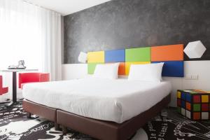 Ein Bett oder Betten in einem Zimmer der Unterkunft Hotel Tristar