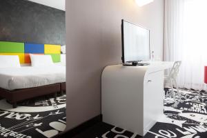 Ein Bett oder Betten in einem Zimmer der Unterkunft Hotel Tristar