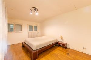 Postel nebo postele na pokoji v ubytování Moments Conviviaux à 20' de Disney