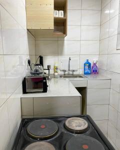 Η κουζίνα ή μικρή κουζίνα στο Fal's Guesthouse