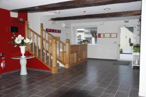 The lobby or reception area at Hôtel Burgevin