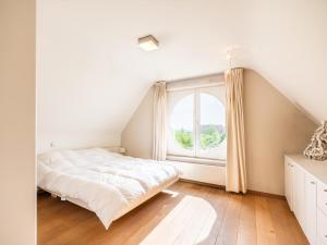 Postel nebo postele na pokoji v ubytování LaRoyale