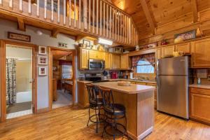 Kuchyň nebo kuchyňský kout v ubytování Apple Cove