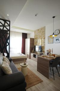 TV a/nebo společenská místnost v ubytování VitaDea Milmari Kopaonik