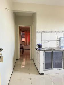 Kuchyň nebo kuchyňský kout v ubytování Hotel Visconde