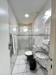 Koupelna v ubytování Hotel Visconde