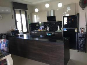 Kuchyň nebo kuchyňský kout v ubytování Villa 4bedrooms at AZHA Sokhna + 11 fotografií