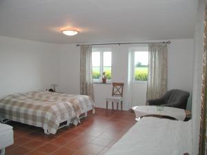 Postel nebo postele na pokoji v ubytování Skönadal B&B