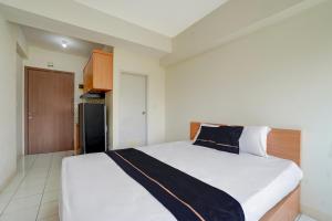 Gallery image of OYO 94837 Apartment Ekki Tower in Tjikuda Dua