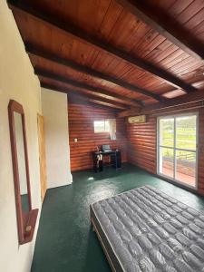 a large room with a bed and a desk at CASA Barrio Parque Mar in Miramar