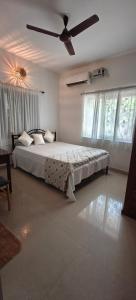 Ένα ή περισσότερα κρεβάτια σε δωμάτιο στο Kritarth